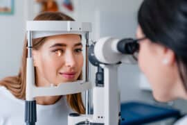 doctor performing eye exam