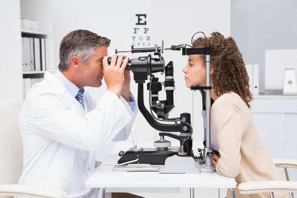 Lasik eye doctor and patient